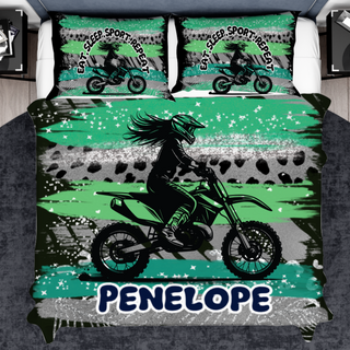 a bed with a motorcycle on it and a name on it