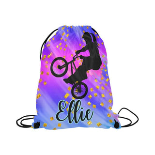 a drawsack bag with a girl on a bike