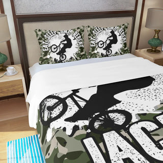 a bedroom with a bed with a bicycle on it