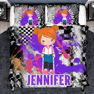 a bed with a picture of a girl on it