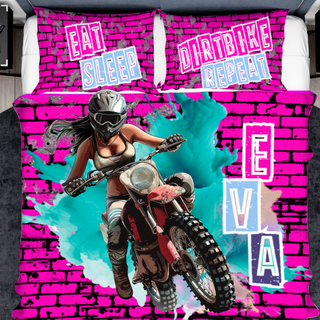 a girl on a dirt bike on a pink brick wall