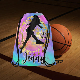 a drawstring bag on a basketball court with the name jenny on it