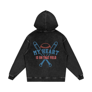 a black hoodie that says, my heart is on that field