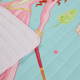 a close up of a pink and blue quilt