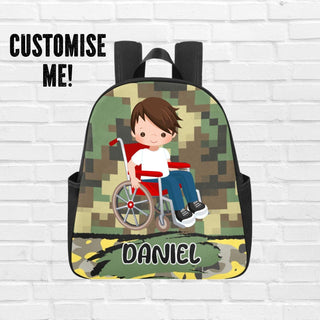 a backpack with a boy in a wheelchair on it