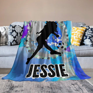 a throw blanket with a soccer player on it