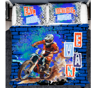 a person riding a dirt bike on a brick wall