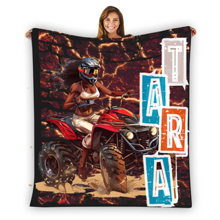 a woman holding up a blanket with a picture of a woman on a motorcycle