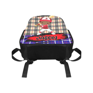 a plaid backpack with a teddy bear on it