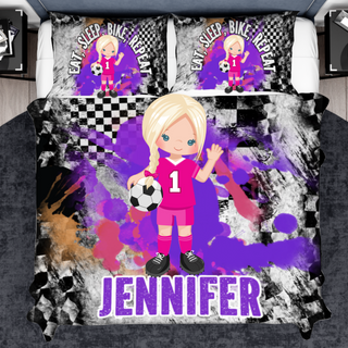 a bed with a soccer girl on it