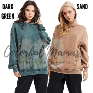 two women wearing sweatshirts with different colors