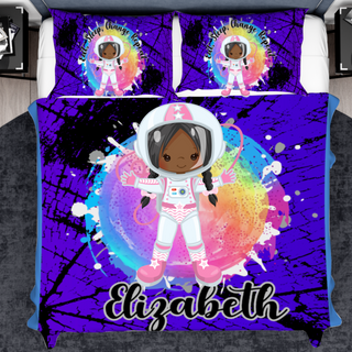 a bed with a picture of an astronaut on it