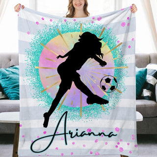 a woman holding a personalized soccer towel