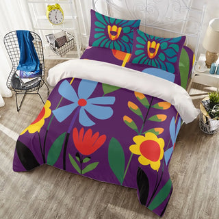 a bed with a purple flower pattern on it