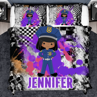 a bed with a picture of a police girl on it