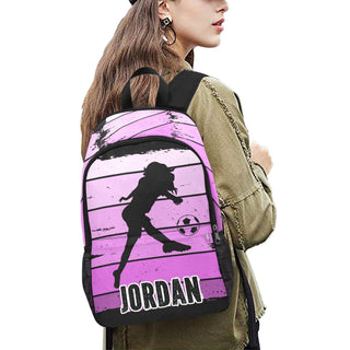 a woman wearing a backpack with a picture of a girl on it