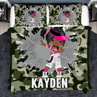 a bed with a camo print and a girl with pink hair