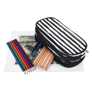 a black and white striped pencil case next to colored pencils