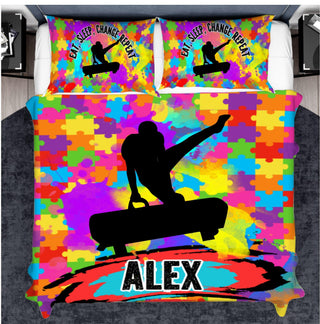 a bed with a colorful comforter with a skateboarder on it