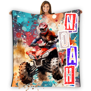 a woman holding a blanket with a picture of a person on a quad