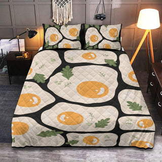 a bed with an orange and black bedspread