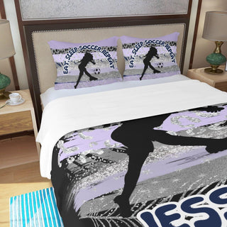 a bed with a picture of a person on it