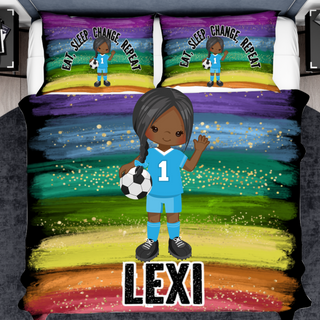 a bed with a cartoon girl holding a soccer ball