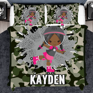 a bed with a camouflage print and a girl in a pink dress