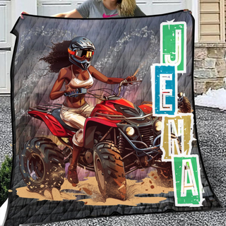 a woman holding a blanket with a picture of a woman on a motorcycle