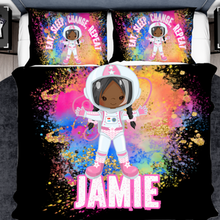 a bed with a picture of an astronaut on it