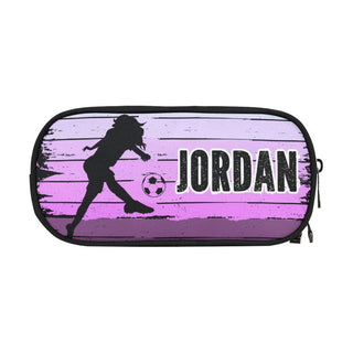 a pencil case with a picture of a girl playing soccer