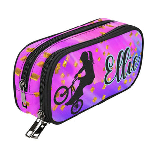 a pink pencil case with a silhouette of a girl on a bike