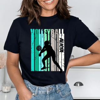 a woman wearing a t - shirt with a volleyball player on it