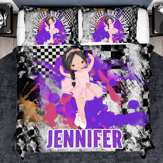 a bed with a picture of a ballerina on it