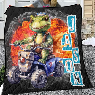 a woman holding a blanket with a picture of a dinosaur riding a motorcycle