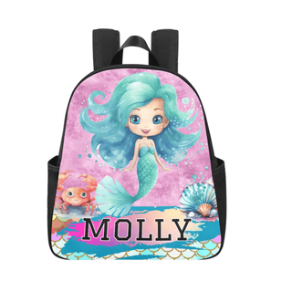 a little girl's backpack with a picture of a mermaid on it