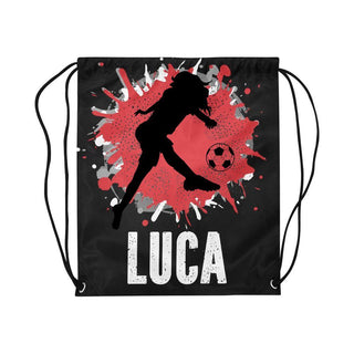 a drawsack bag with a girl kicking a soccer ball