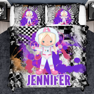 a bed with a picture of a girl on it