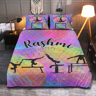 a bed with a colorful comforter and pillows