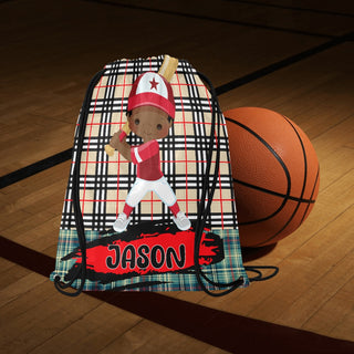 a bag with a baseball player on it next to a basketball