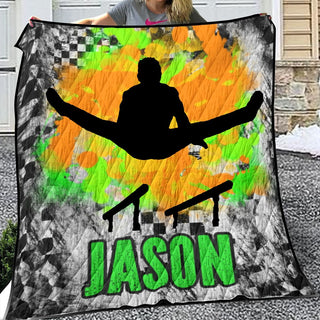 a woman holding up a snowboarder quilt