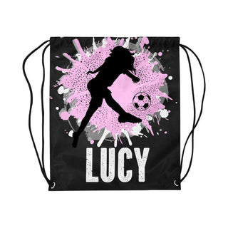 a drawsack bag with a girl kicking a soccer ball