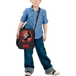 a young boy is holding a skateboard bag