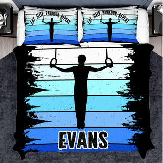 a bed with a picture of a man holding a barbell