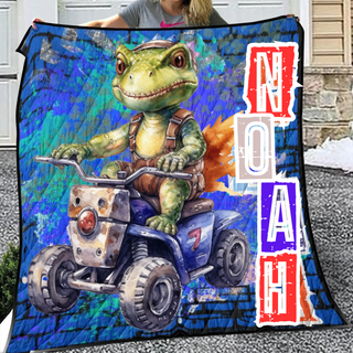 a woman holding up a blanket with a picture of a frog on a four wheeler