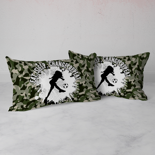 two pillows with a camo print of a soccer player