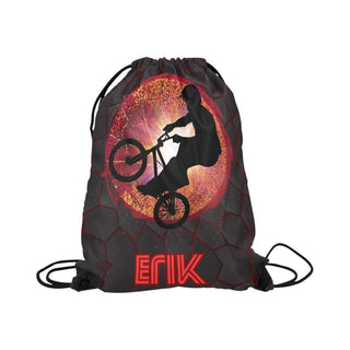 a drawsack bag with a picture of a man riding a bike