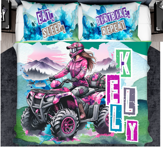 a bed with a picture of a girl riding a four wheeler