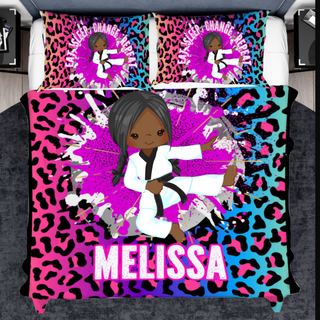 a bed with a purple and black girl on it