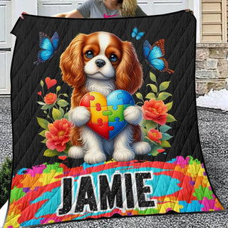 a woman holding a blanket with a dog on it